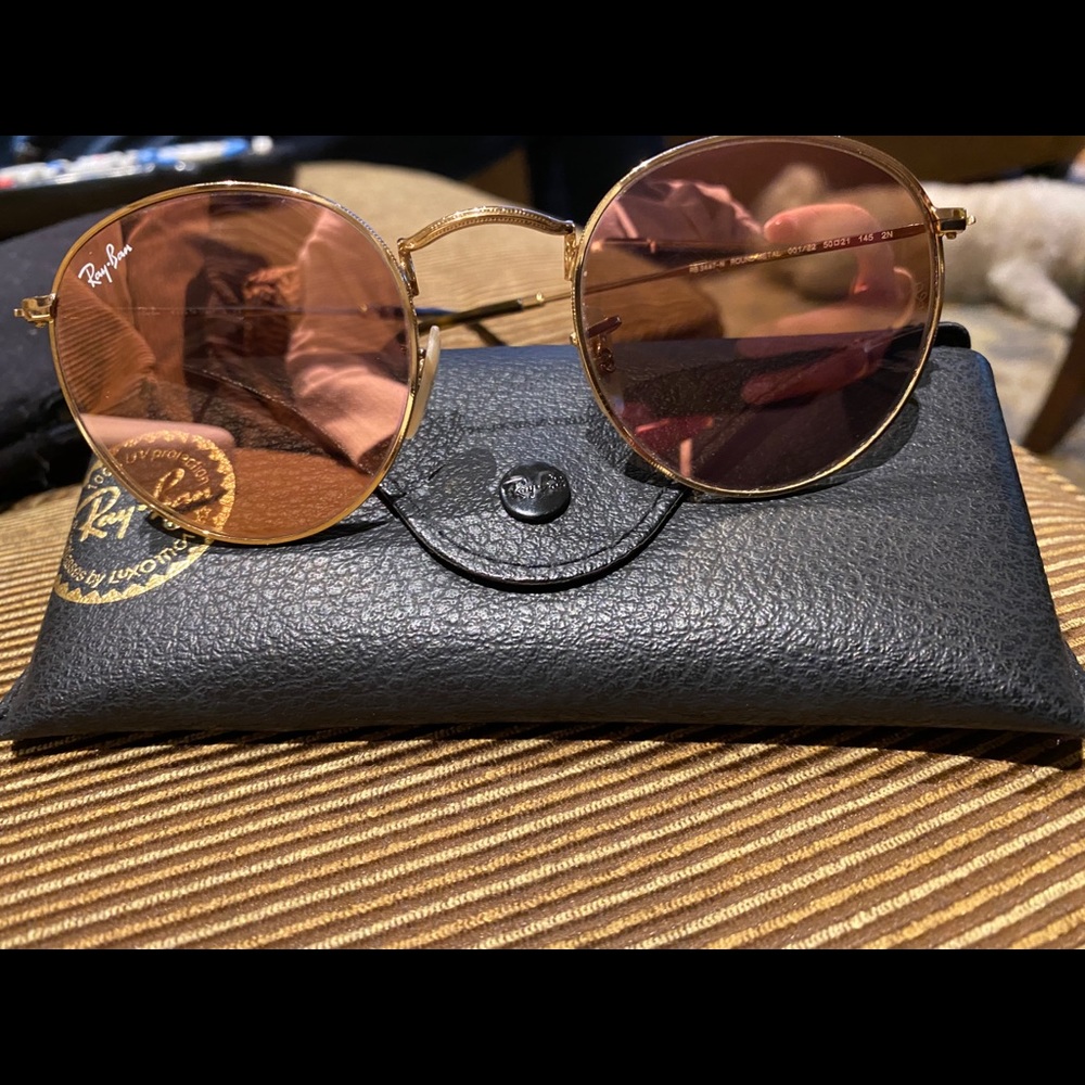 Raybans with pink frames